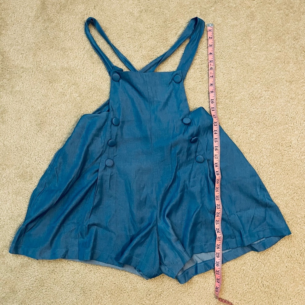 Unique Vintage 2X blue overalls with zipper back and button details!